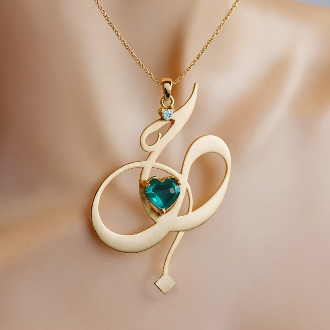 Hob Diwani – Gold Necklace with Teal Heart Gem